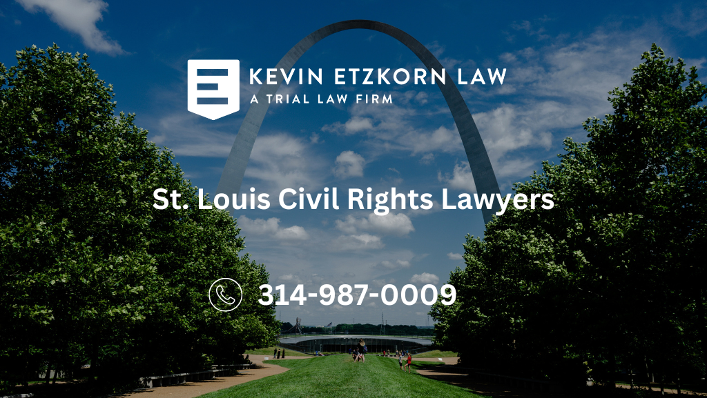 A law firm's branding graphic with the logo of Kevin Etzkorn Law and the text 'St. Louis Civil Rights Lawyers,' accompanied by a phone number (314-987-0009). The backdrop is the Gateway Arch in St. Louis, with trees and a clear blue sky.