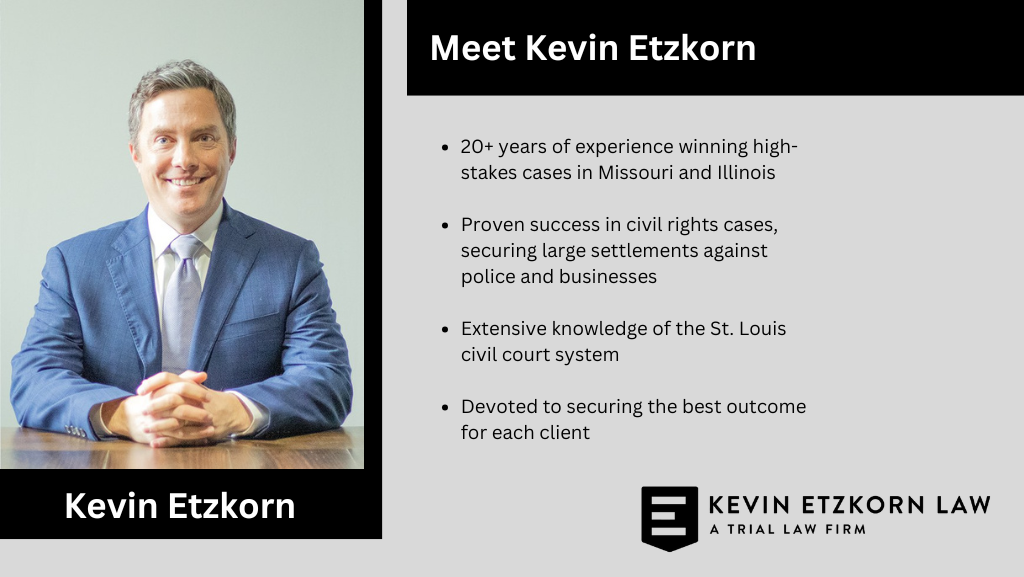 Kevin Etzkorn, an experienced St. Louis civil rights lawyer, seated at a desk, with text highlighting his expertise in St. Louis civil rights law.